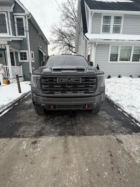 Front view of a dark pickup truck