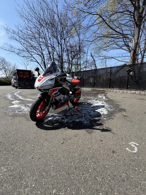 Red motorcycle parked outdoors